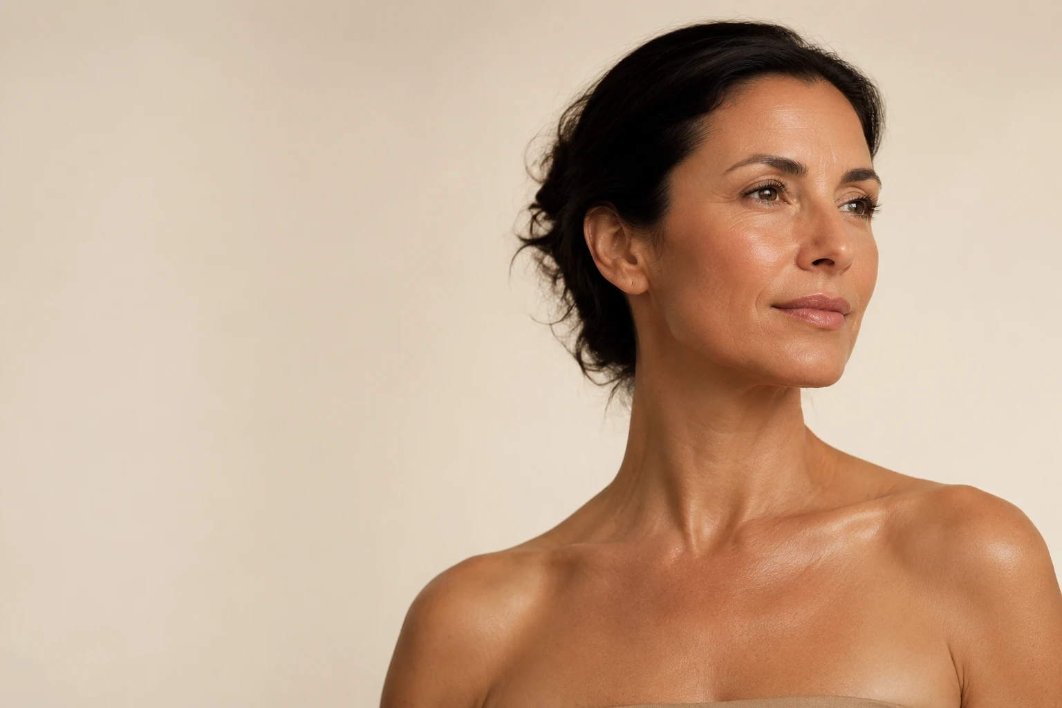Woman with naturally defined jawline representing Radiesse treatment in Aventura